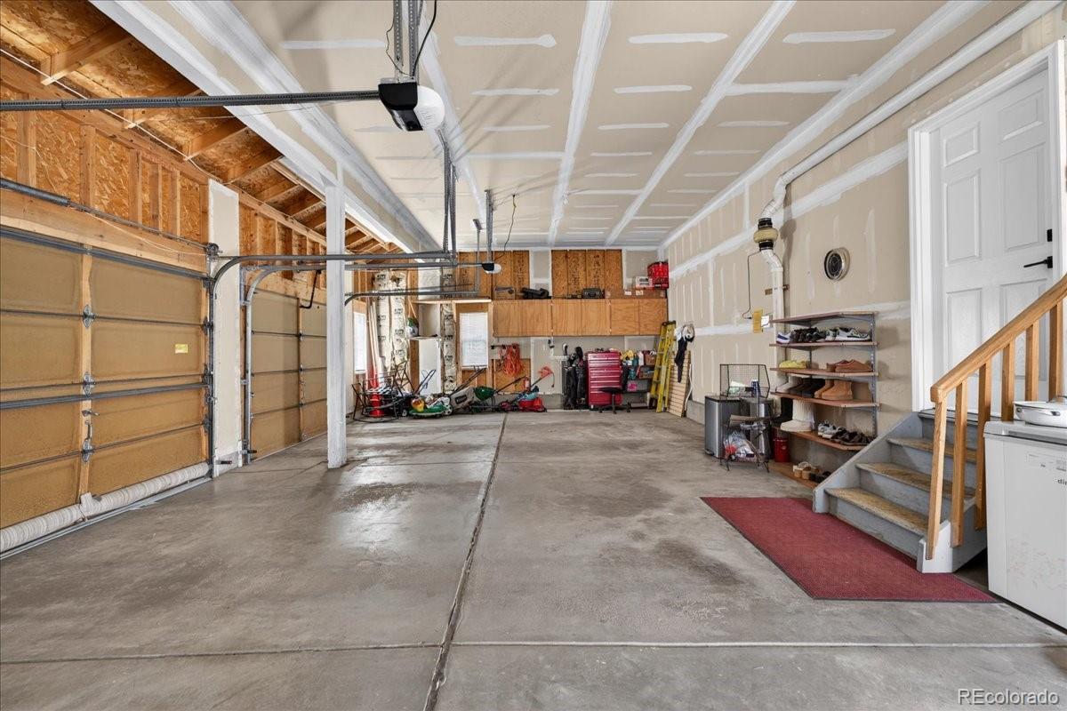 9477 Burgundy Circle Highlands Ranch, CO 80126 - Photo 45 of 50 a view of a garage with storage
