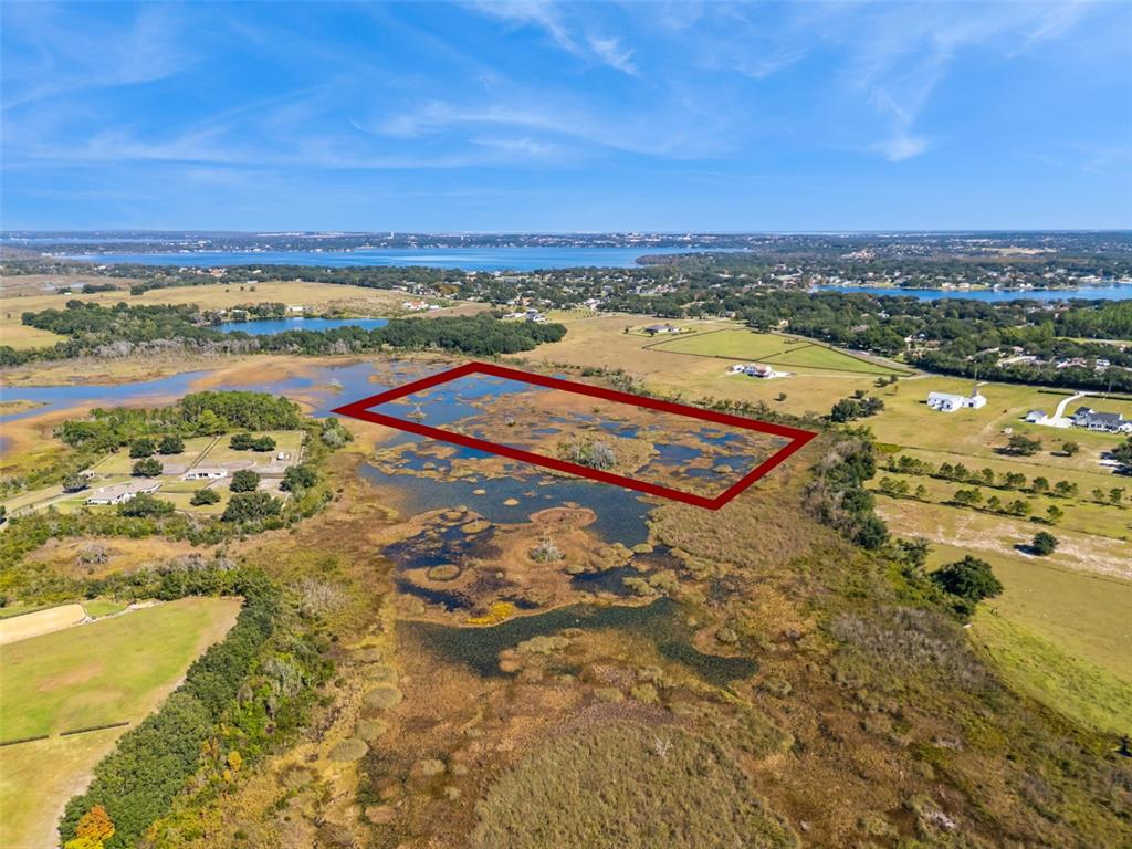 Old Grove Road Clermont, FL 34711 - Photo 11 of 14 a view of an ocean and city