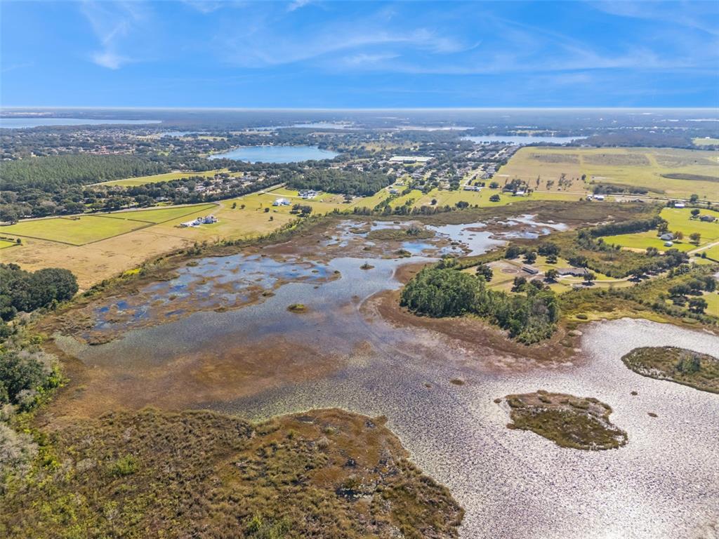 Old Grove Road Clermont, FL 34711 - Photo 2 of 14 a view of an ocean and beach