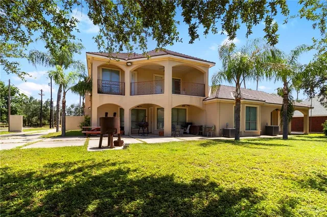 a view of a building with a swimming pool