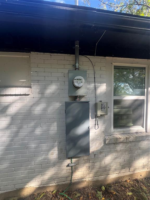 1722 Proctor Street Grand Prairie, TX 75051 - Photo 13 of 39 Exterior view of electric meter