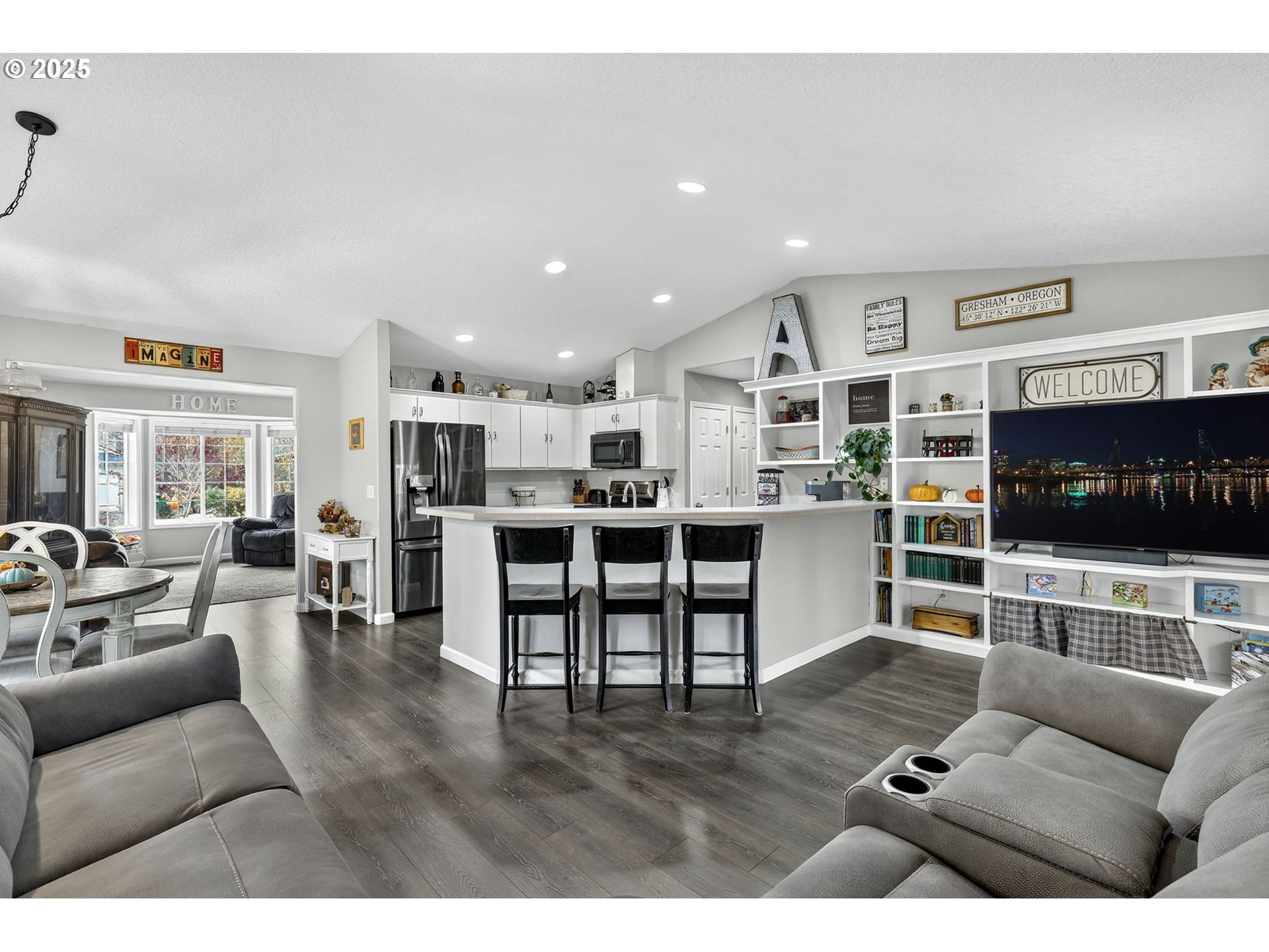 3915 Southeast 14th Street Gresham, OR 97080 - Photo 12 of 46 a living room with furniture and a flat screen tv