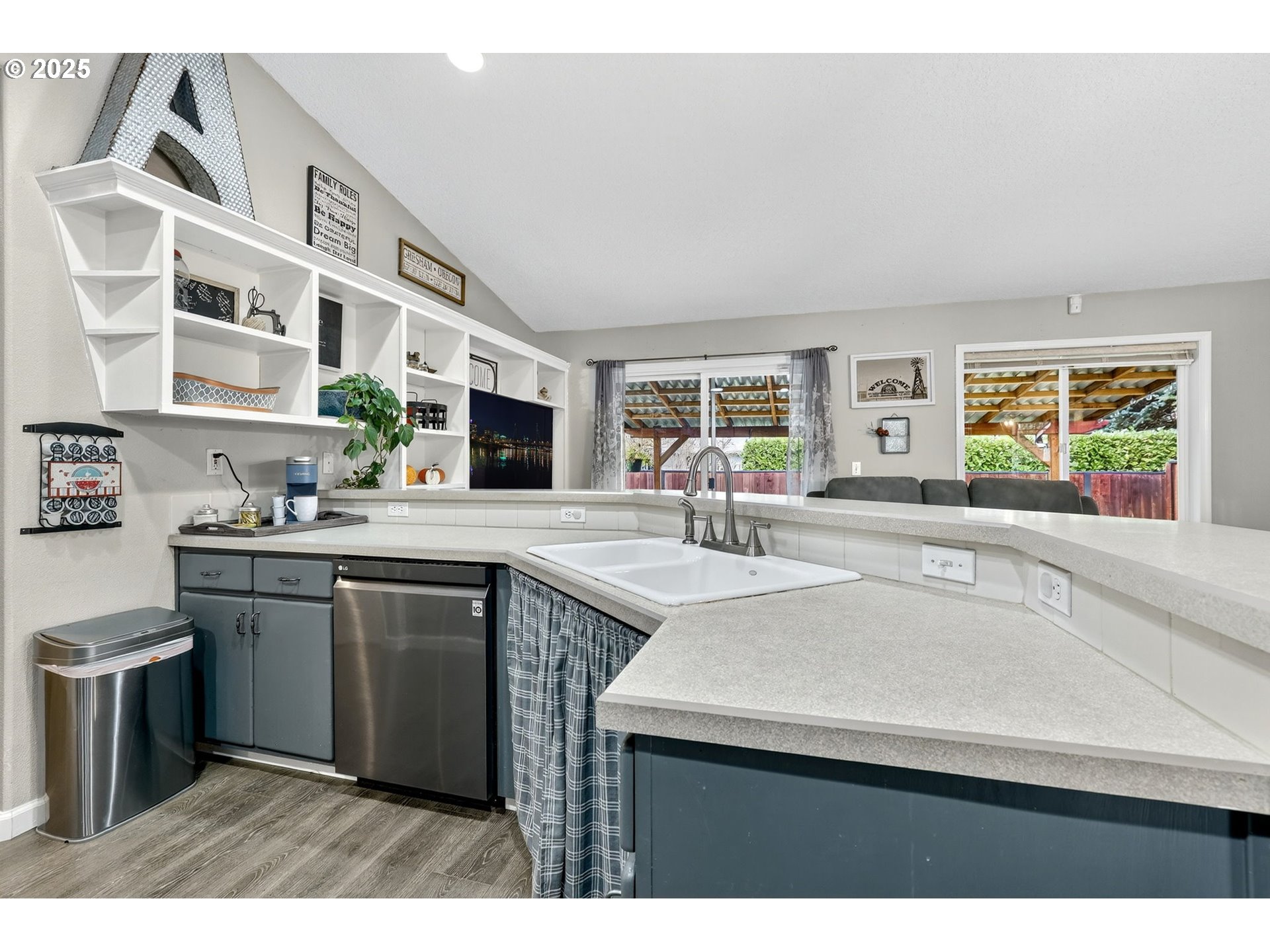 3915 Southeast 14th Street Gresham, OR 97080 - Photo 14 of 46 a kitchen with stainless steel appliances granite countertop a sink and a stove