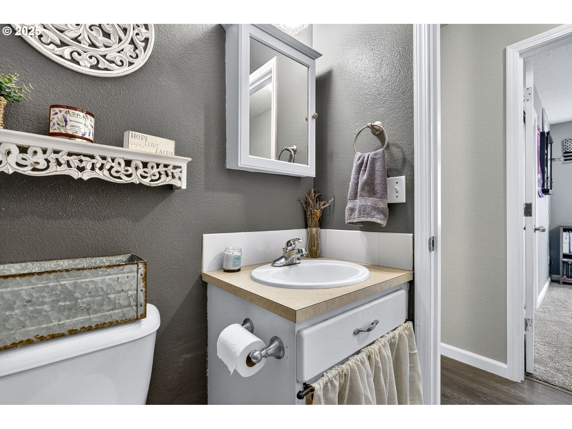 3915 Southeast 14th Street Gresham, OR 97080 - Photo 27 of 46 a bathroom with a sink and a mirror