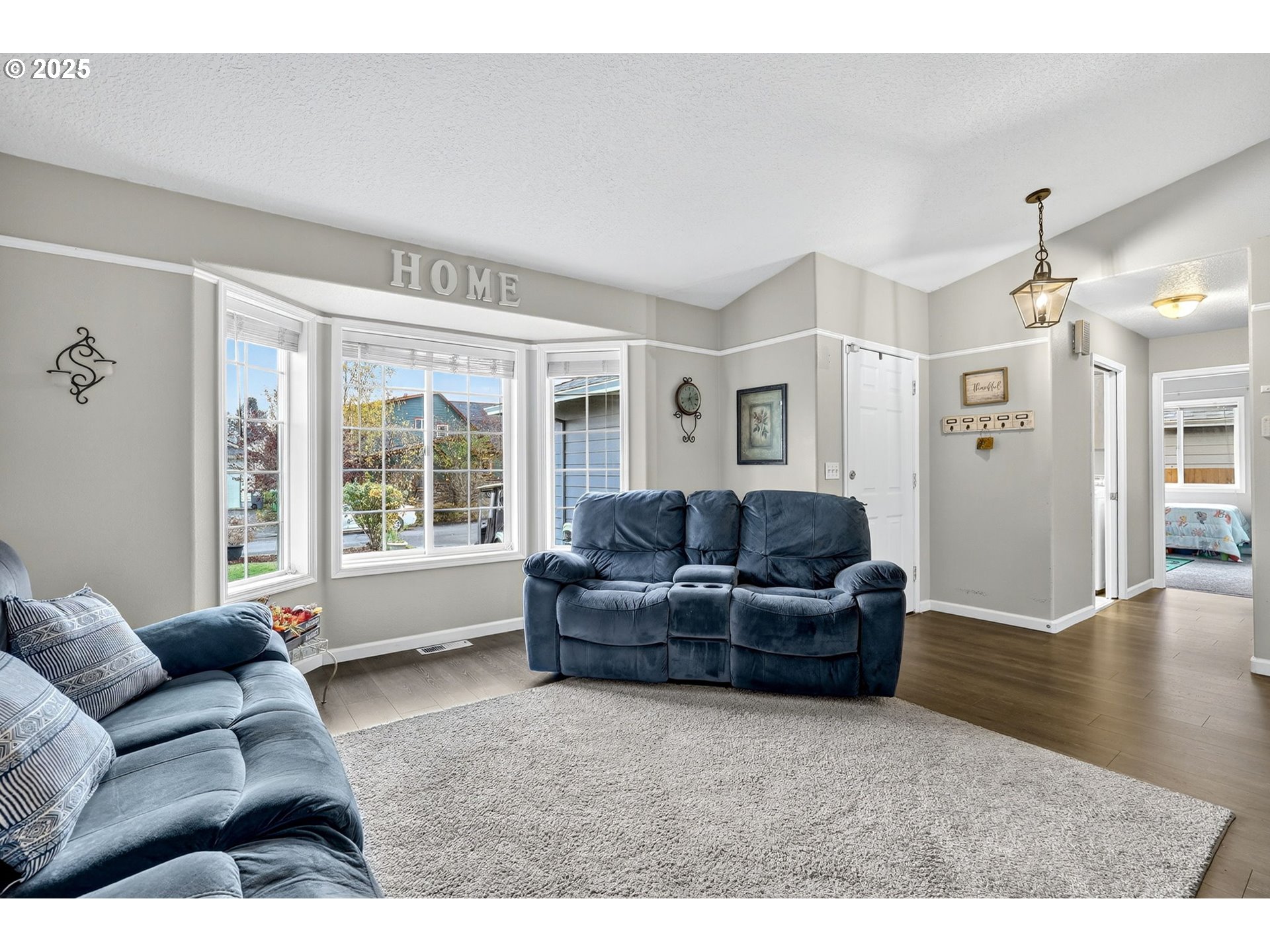 3915 Southeast 14th Street Gresham, OR 97080 - Photo 3 of 46 a living room with furniture and a large window