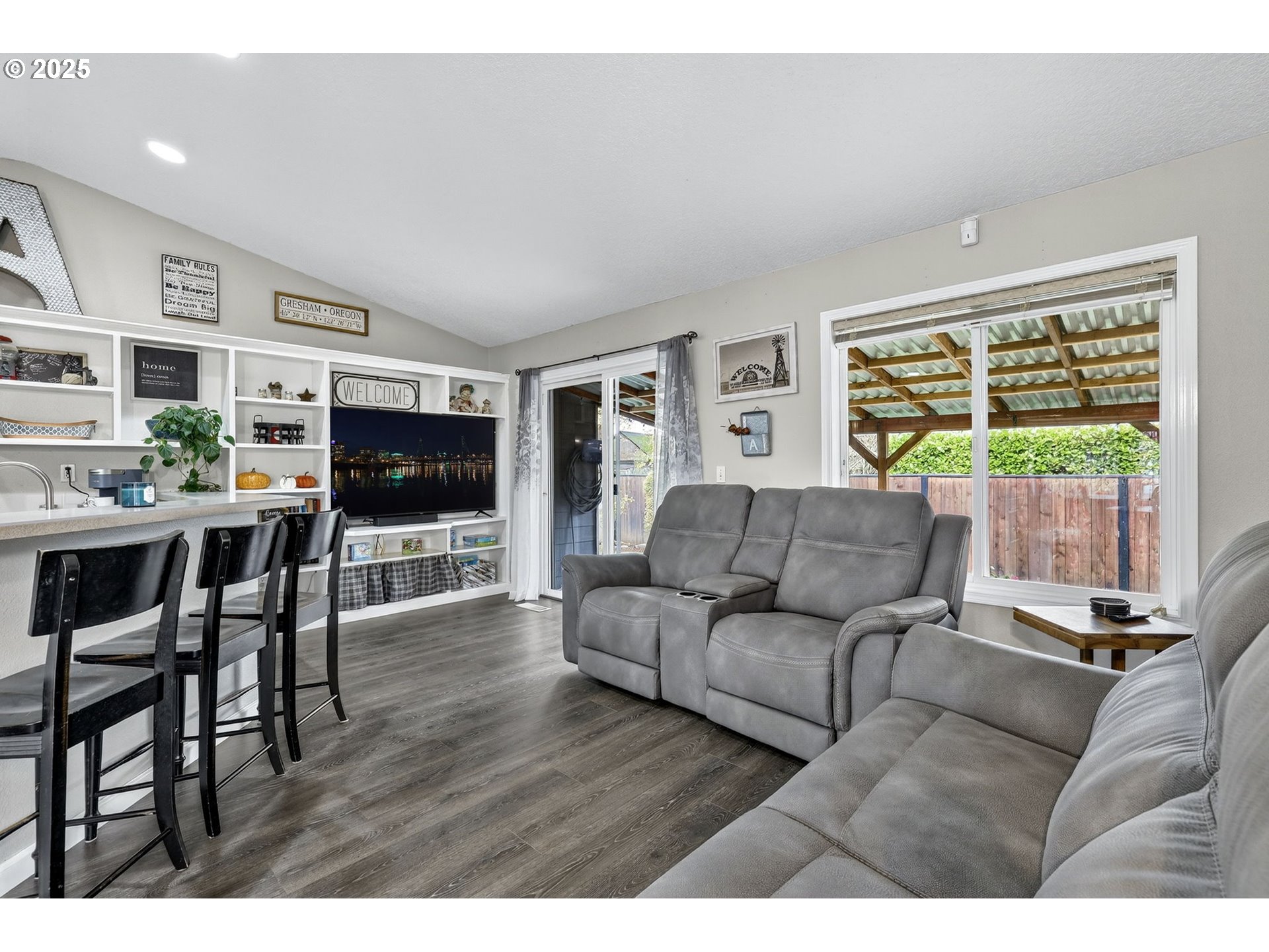 3915 Southeast 14th Street Gresham, OR 97080 - Photo 8 of 46 a living room with furniture and a flat screen tv