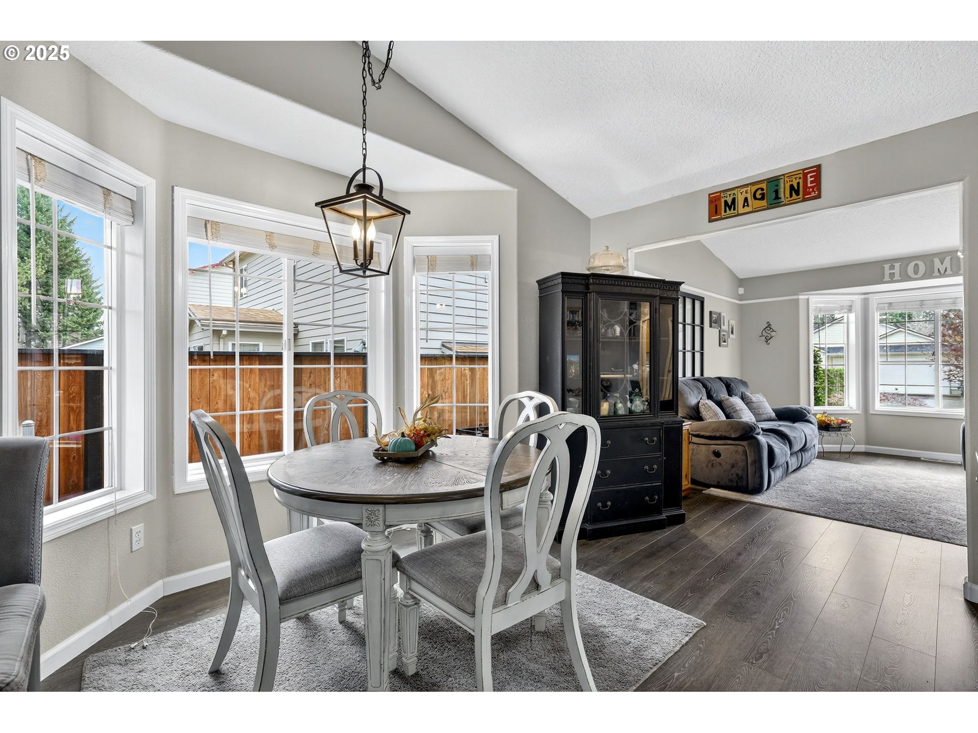 3915 Southeast 14th Street Gresham, OR 97080 - Photo 10 of 46 a dining room with furniture window and wooden floor