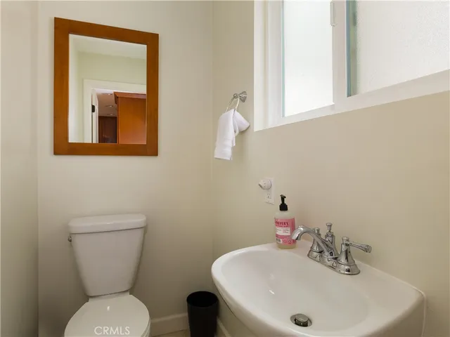 a room with lots of books and cabinets