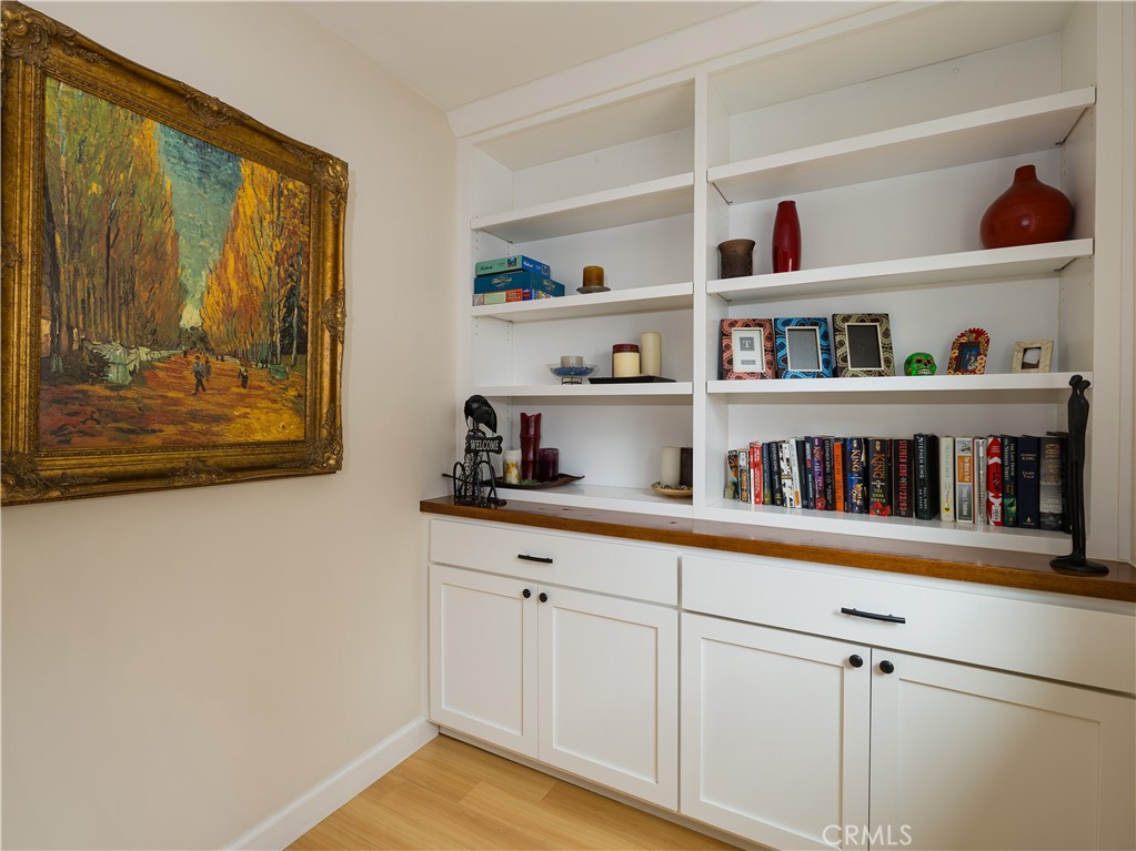 955 Virginia Street El Segundo, CA 90245 - Photo 26 of 43 a room with lots of books and cabinets
