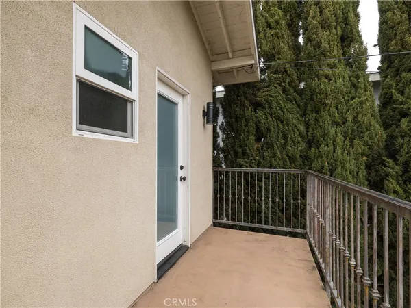 a view of a backyard of the house