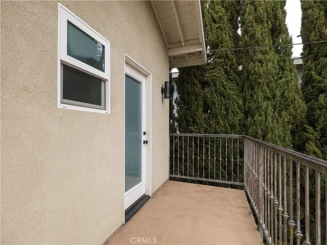 a view of a backyard of the house