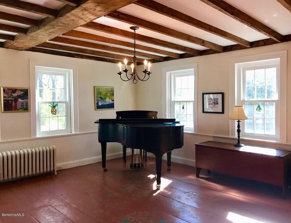 123 Frank Williams Road Shelburne, MA 01370 - Photo 11 of 30 a living room with furniture and a window