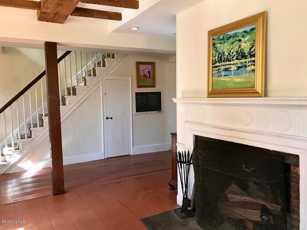 123 Frank Williams Road Shelburne, MA 01370 - Photo 12 of 30 a view of a livingroom with furniture and a fireplace
