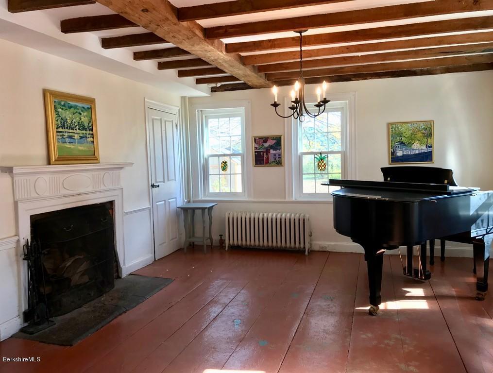 123 Frank Williams Road Shelburne, MA 01370 - Photo 14 of 30 a livingroom with furniture and a fireplace