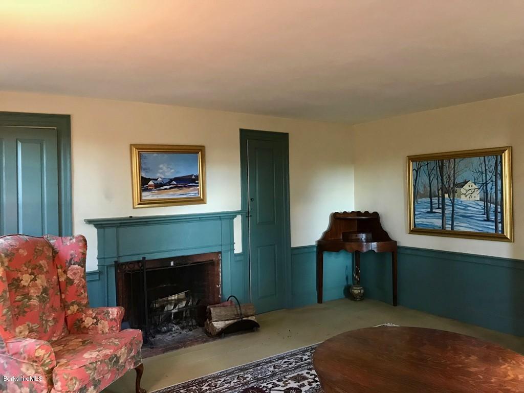 123 Frank Williams Road Shelburne, MA 01370 - Photo 15 of 30 a living room with furniture and a fireplace