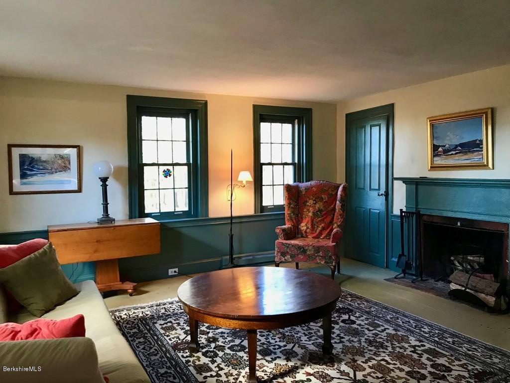 123 Frank Williams Road Shelburne, MA 01370 - Photo 16 of 30 a living room with furniture and a fireplace
