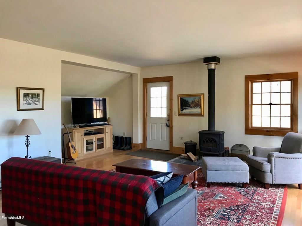 123 Frank Williams Road Shelburne, MA 01370 - Photo 19 of 30 a bedroom with a bed and a couch