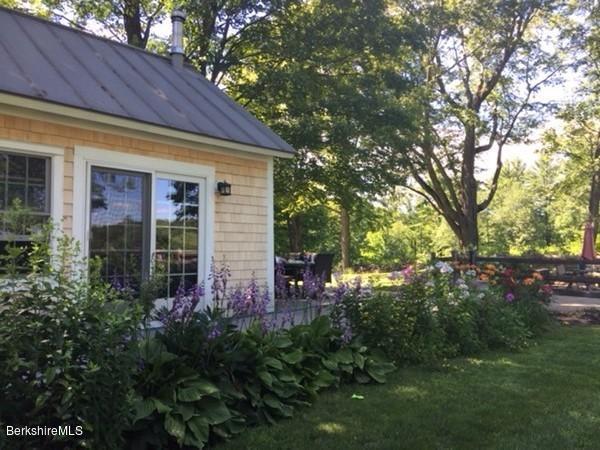 123 Frank Williams Road Shelburne, MA 01370 - Photo 26 of 30 a view of a house with balcony and garden