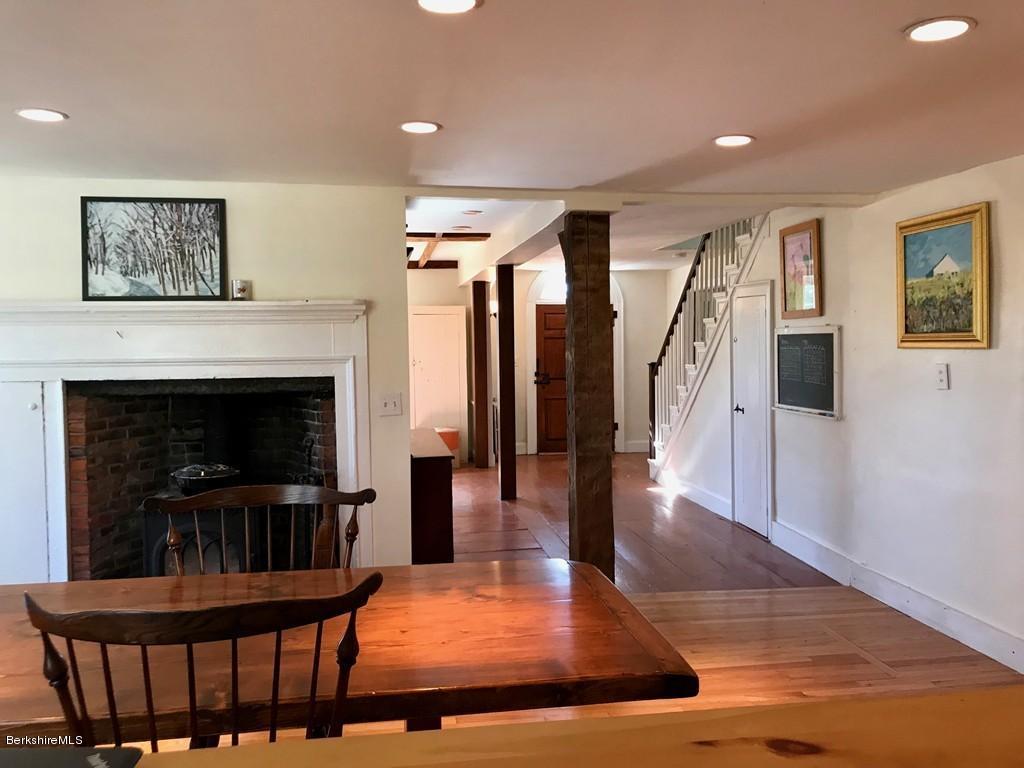 123 Frank Williams Road Shelburne, MA 01370 - Photo 10 of 30 a view of a livingroom with furniture fire place and wooden floor