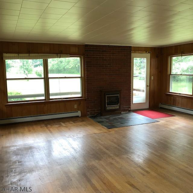 525 Egolf Road Bedford, PA 15522 - Photo 21 of 61 an empty room with wooden floor and windows