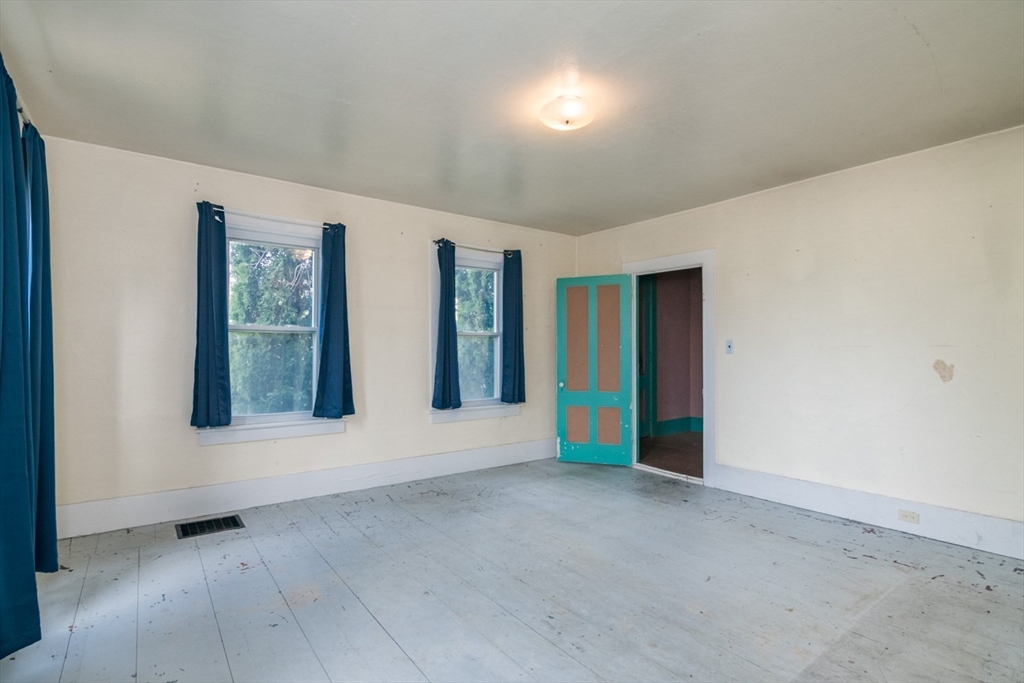 464 Main Road Gill, MA 01354 - Photo 15 of 41 an empty room with windows