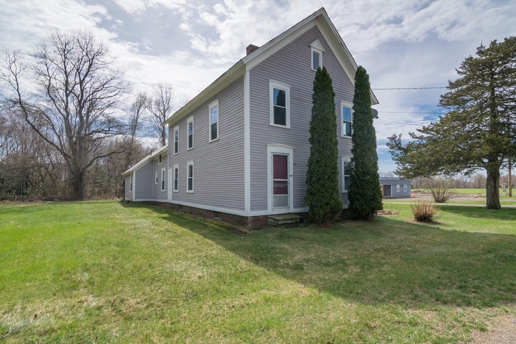 464 Main Road Gill, MA 01354 - Photo 2 of 41 a view of a house with a yard