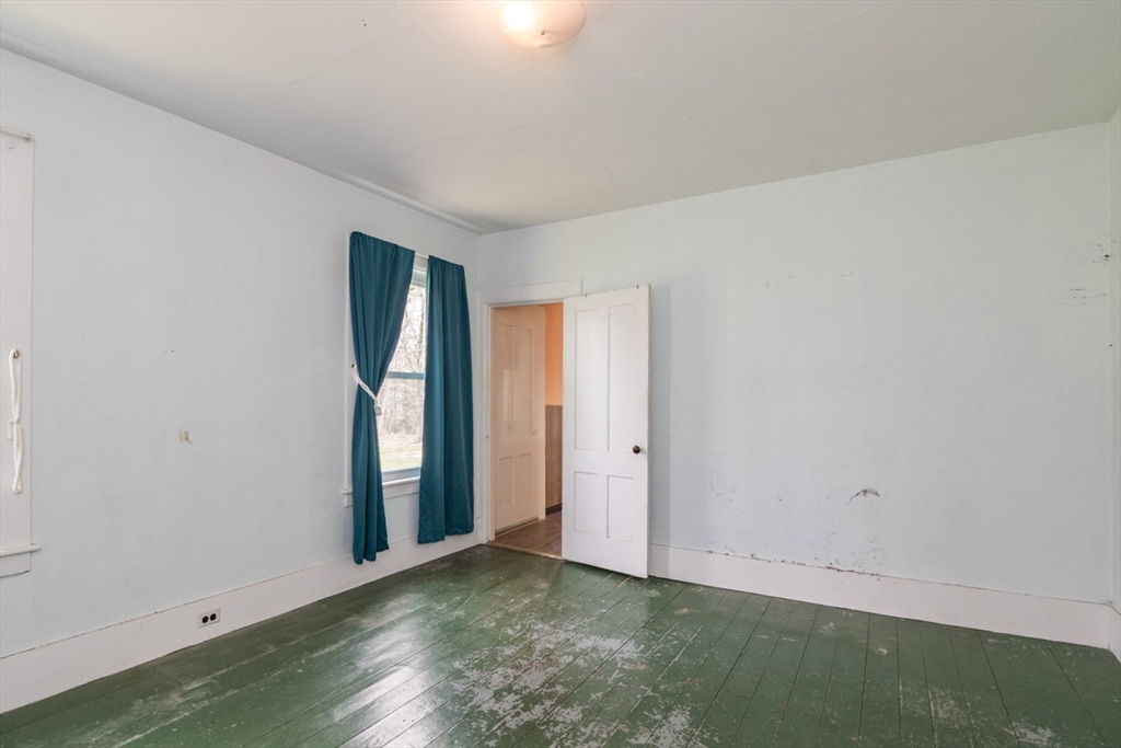 464 Main Road Gill, MA 01354 - Photo 23 of 41 a view of an empty room and window