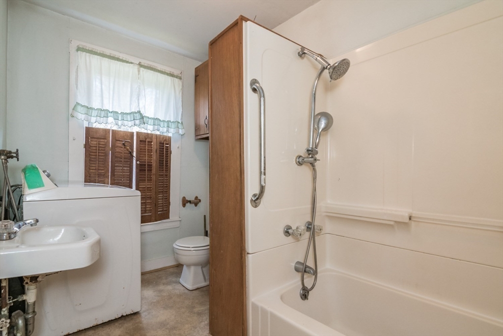 464 Main Road Gill, MA 01354 - Photo 25 of 41 a bathroom with a sink a toilet and shower