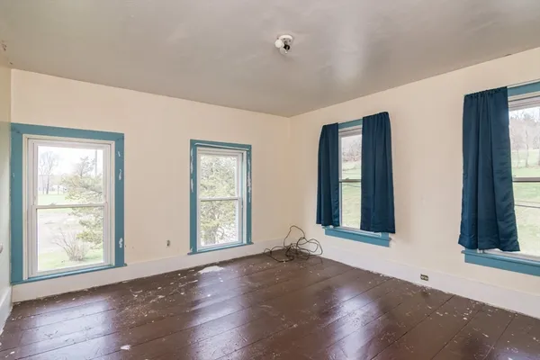 an empty room with windows