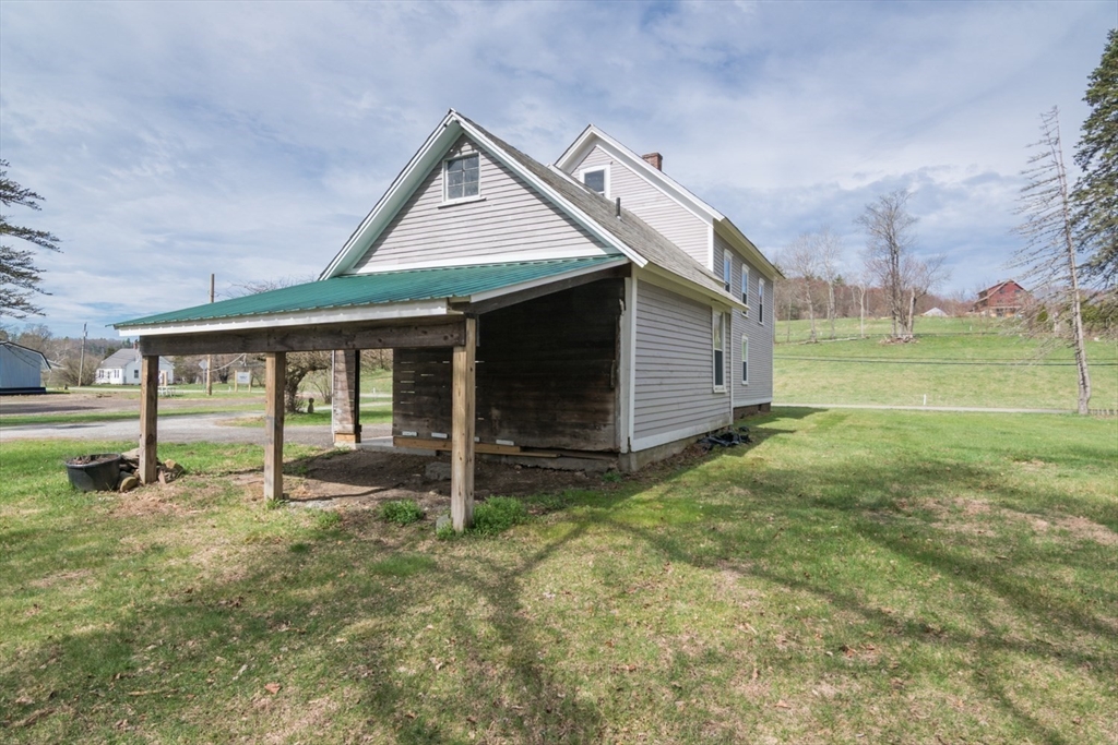 464 Main Road Gill, MA 01354 - Photo 6 of 41 a house with garden in front of it
