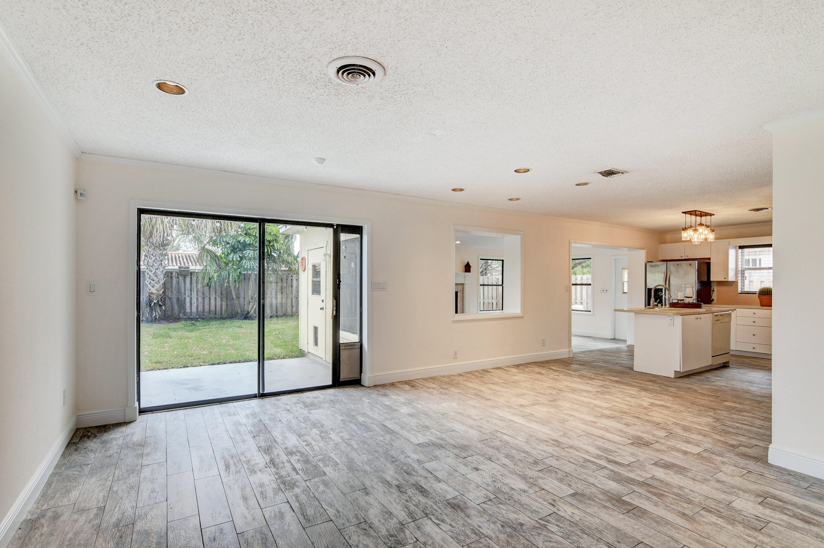 584 Northwest 16th Court Boca Raton, FL 33486 - Photo 23 of 63 Slider to backyard