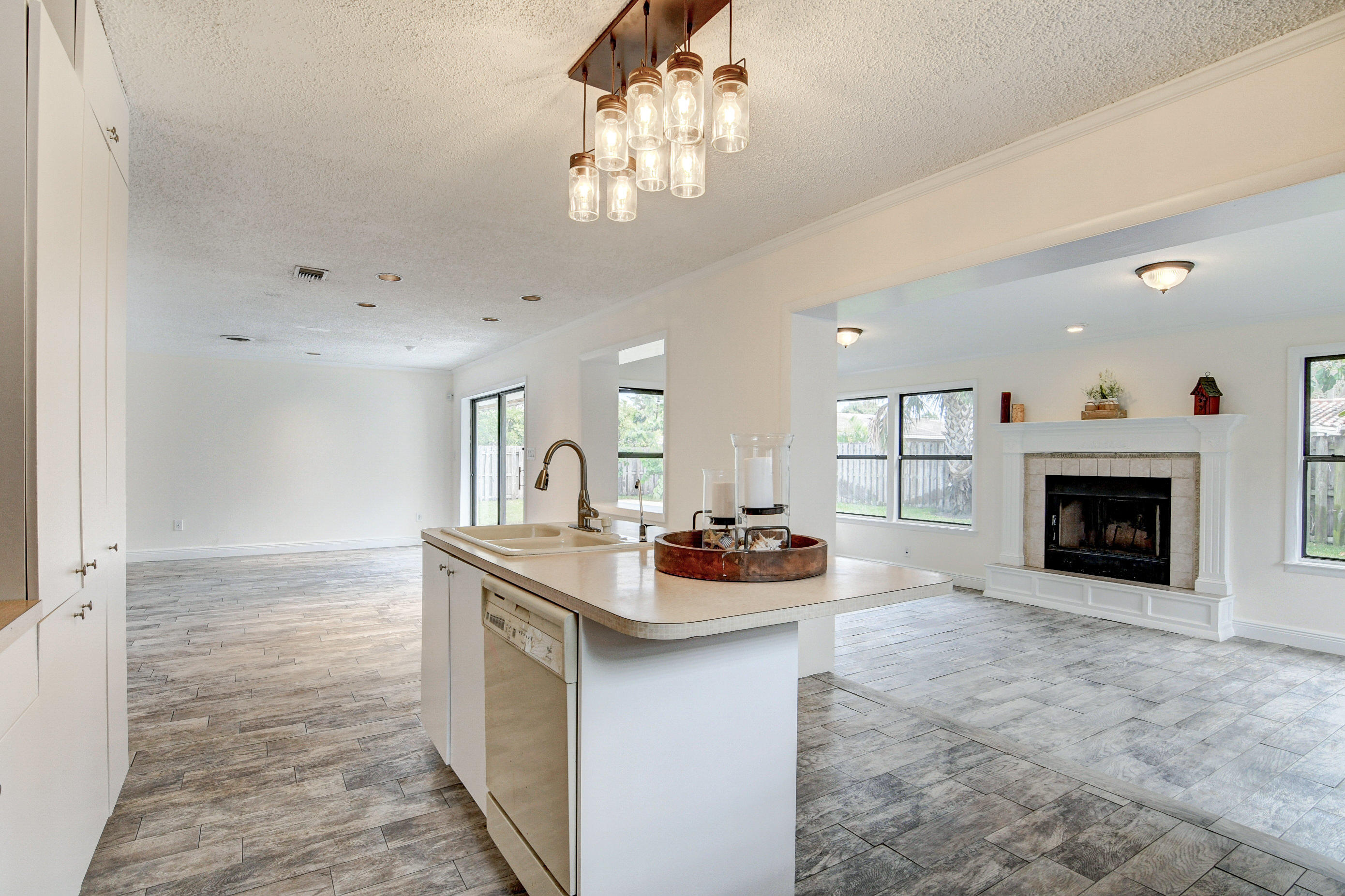 584 Northwest 16th Court Boca Raton, FL 33486 - Photo 29 of 63 kitchen opens to family rm