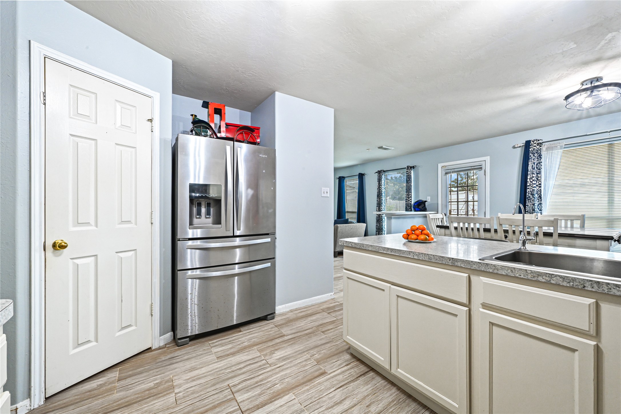 3726 Forney Ridge Lane Houston, TX 77047 - Photo 8 of 25 Additional kitchen view highlighting the island and open layout.