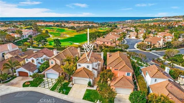 an aerial view of residential building with an ocean view