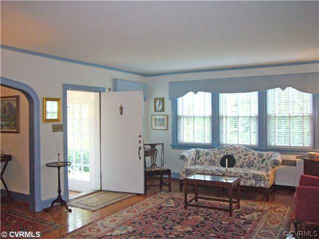 7328 Cherokee Road Richmond, VA 23225 - Photo 3 of 12 a living room with furniture and a large window