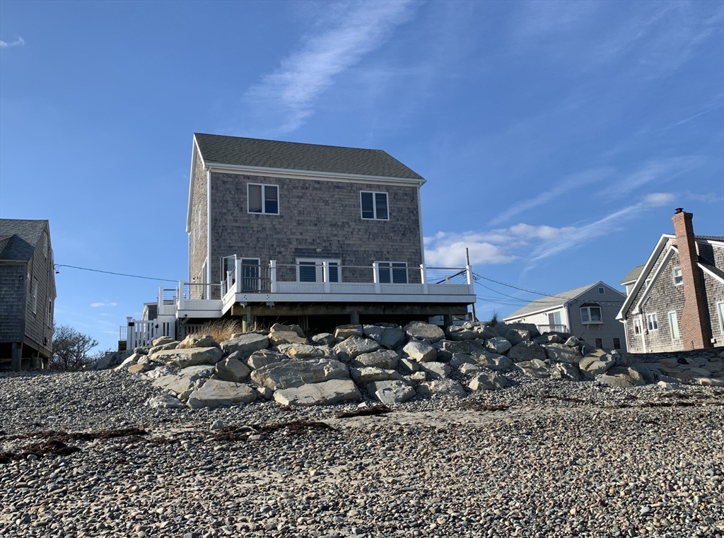 1 East Street Marshfield, MA 02050 - Photo 1 of 16 a front view of a house with a yard
