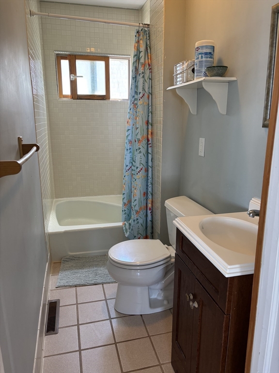 1 East Street Marshfield, MA 02050 - Photo 11 of 16 a bathroom with a sink a toilet and shower