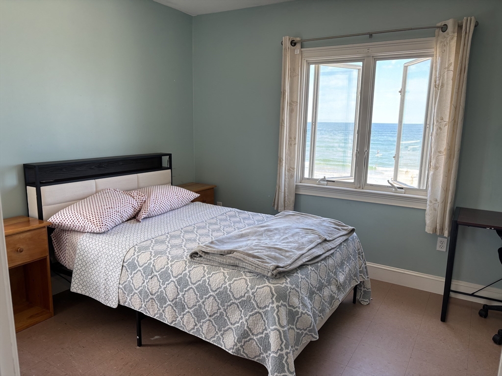 1 East Street Marshfield, MA 02050 - Photo 5 of 16 a bedroom with a bed lamp and a window
