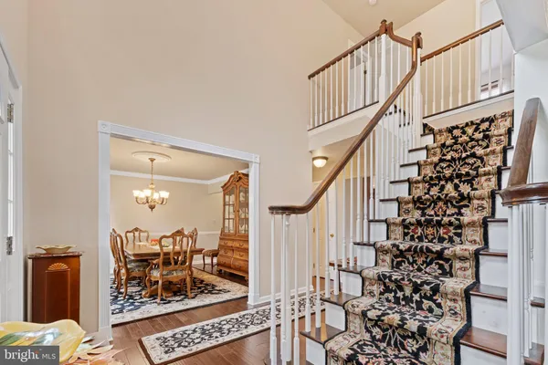 a view of entryway with wooden floor