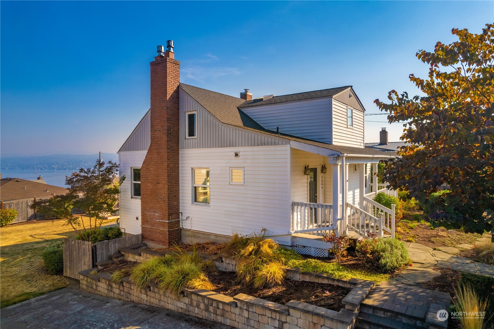 7544 South Sunnycrest Road Seattle, WA 98178 - Photo 13 of 40 a view of a house with a patio