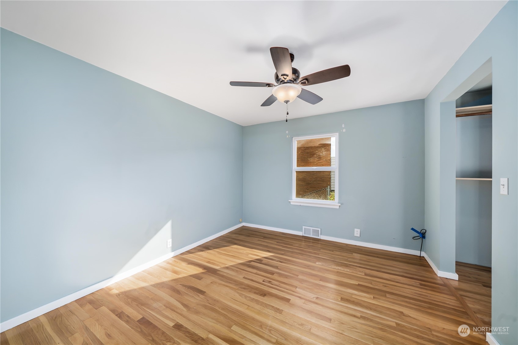 7544 South Sunnycrest Road Seattle, WA 98178 - Photo 26 of 40 a view of a big room with wooden floor and windows