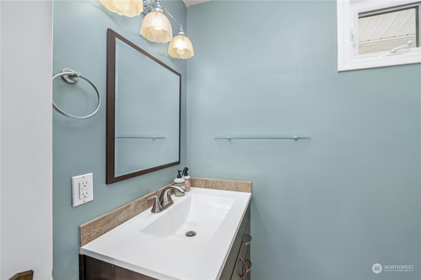 7544 South Sunnycrest Road Seattle, WA 98178 - Photo 28 of 40 a bathroom with a sink and a mirror