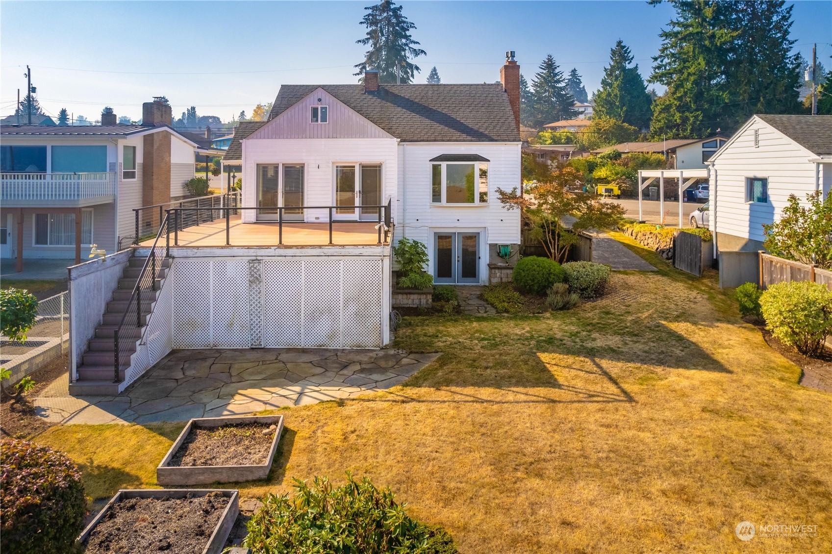 7544 South Sunnycrest Road Seattle, WA 98178 - Photo 4 of 40 a view of a house with a patio