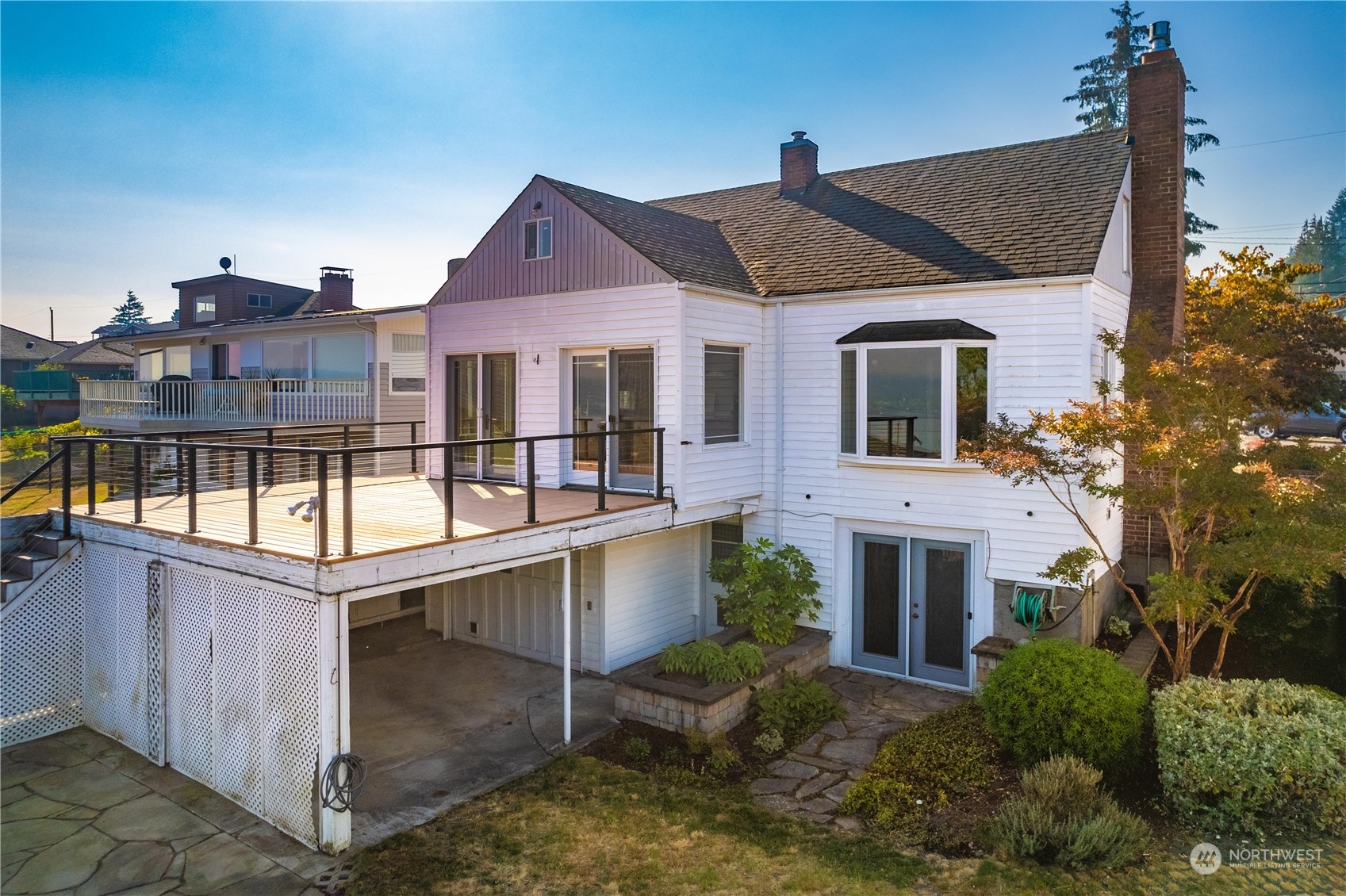 7544 South Sunnycrest Road Seattle, WA 98178 - Photo 5 of 40 a front view of a house with a yard