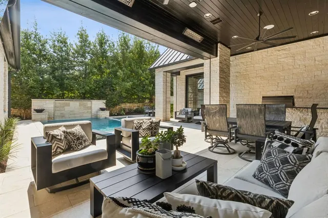 a outdoor living space with furniture and garden view