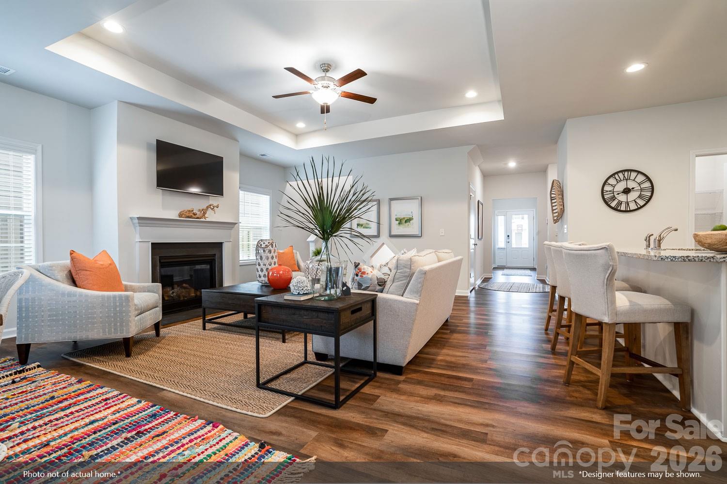 204 Rodeo Drive, Unit 26 Shelby, NC 28150 - Photo 11 of 19 a living room with furniture a flat screen tv and a fireplace