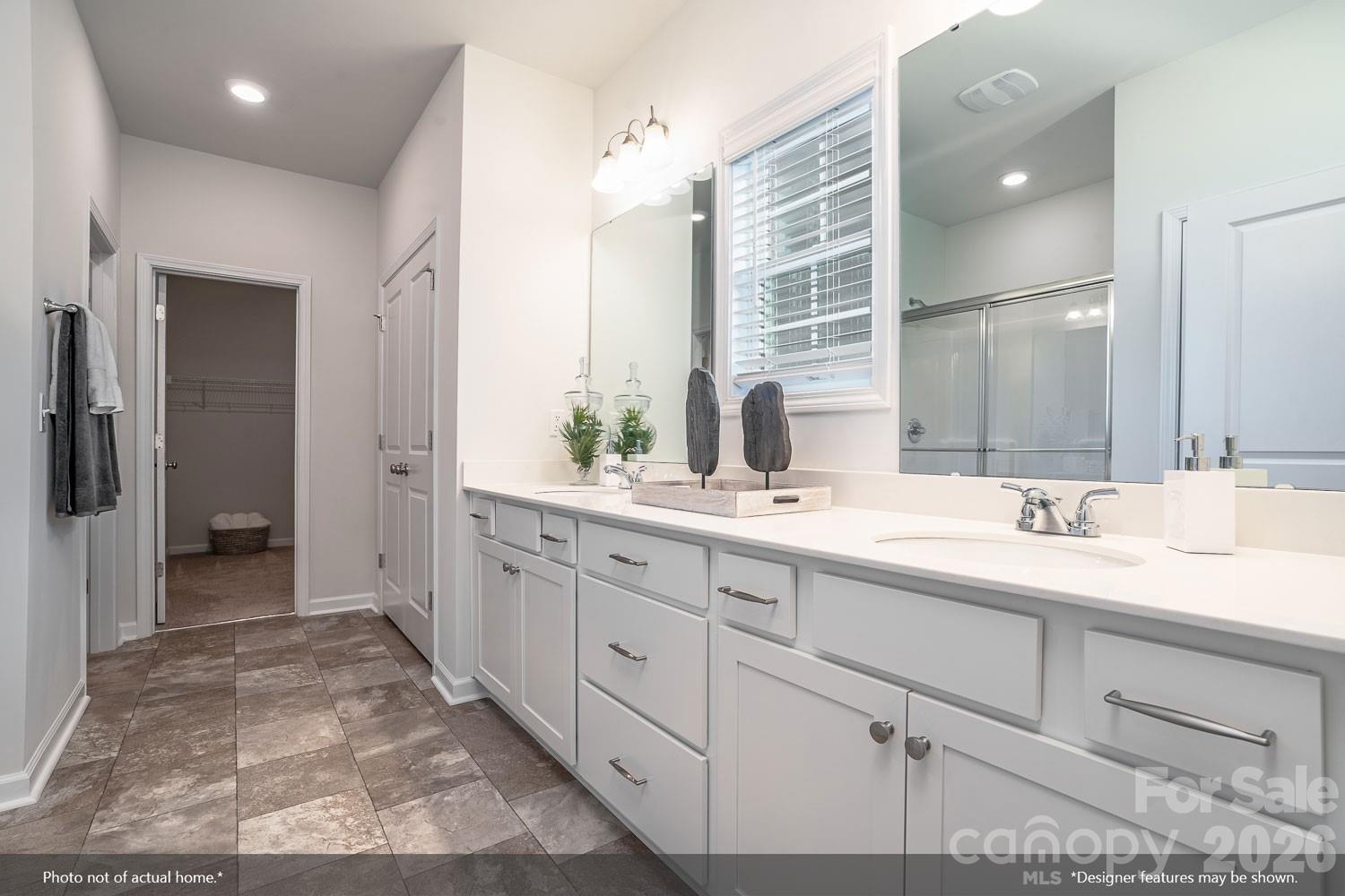 204 Rodeo Drive, Unit 26 Shelby, NC 28150 - Photo 16 of 19 a spacious bathroom with double sink and a mirror