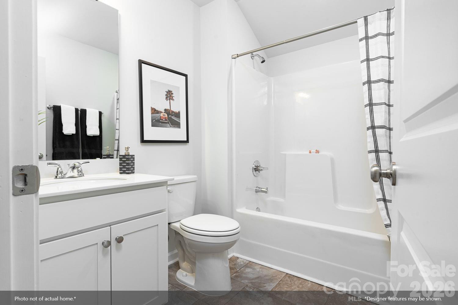 204 Rodeo Drive, Unit 26 Shelby, NC 28150 - Photo 17 of 19 a bathroom with a sink toilet and shower