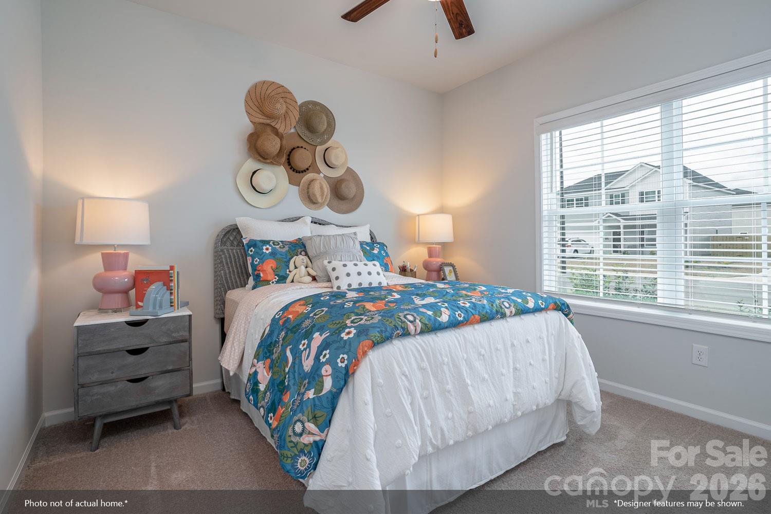 204 Rodeo Drive, Unit 26 Shelby, NC 28150 - Photo 19 of 19 a bedroom with a bed and a window