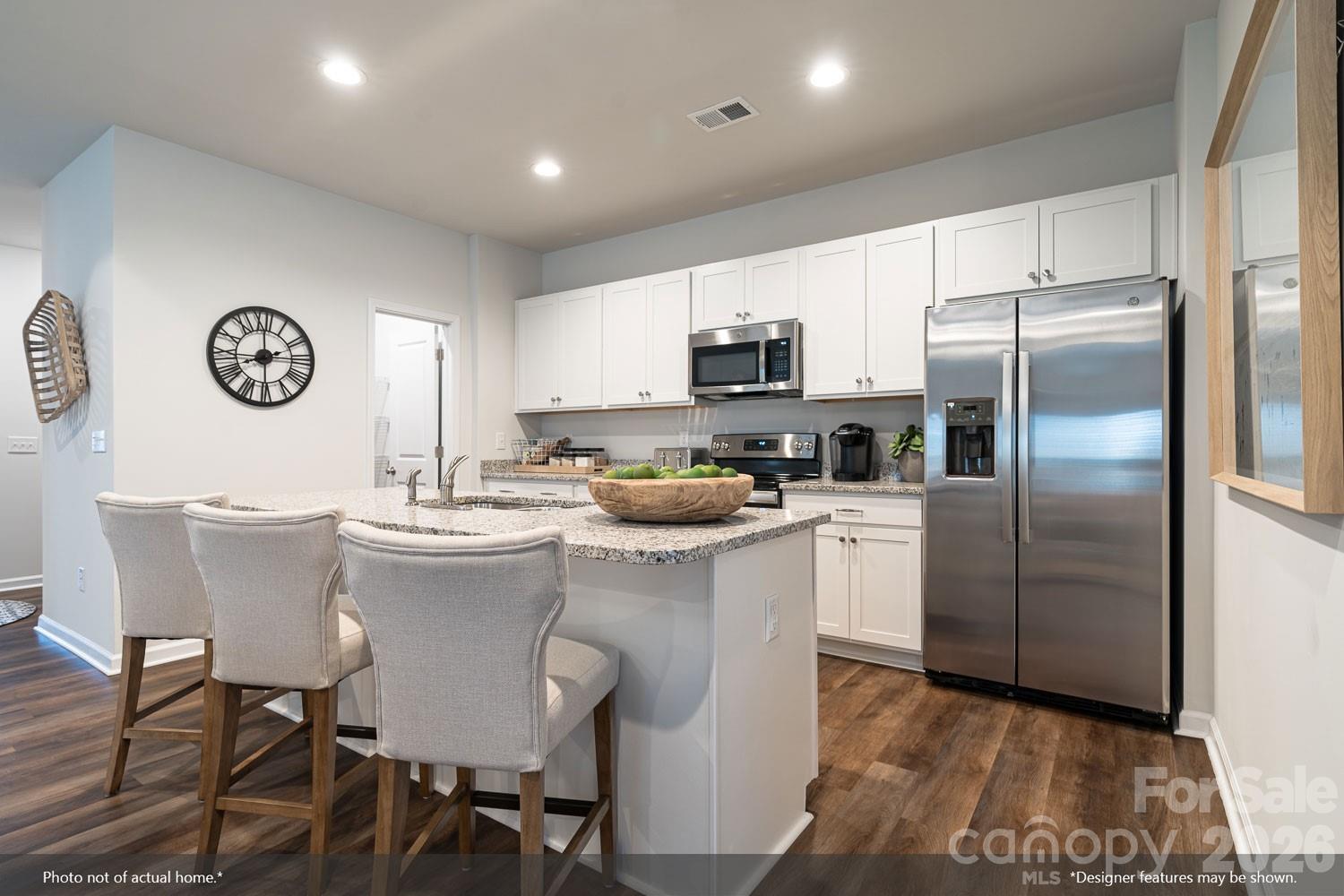 204 Rodeo Drive, Unit 26 Shelby, NC 28150 - Photo 4 of 19 a kitchen with a sink cabinets and refrigerator